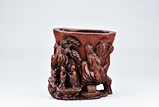 A HUANGYANGMU CARVED 'FIGURES' BRUSHPOT