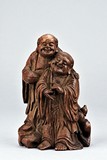 A BAMBOO CARVING OF HEHE ERXIAN