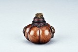 A SMALL GOURD CARVED VESSEL