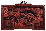 A CINNABAR LACQUER 'DRAGON DANCE' HANGING PANEL