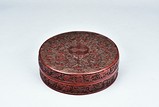 A CIRCULAR CINNABAR LACQUER BOX AND COVER