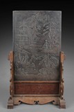 A CARVED HARDWOOD TABLE SCREEN INSET WITH DUAN STONE