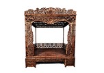 A HUALI WOOD CARVED FOUR-POST CANOPY BED