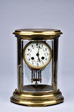A FRENCH GILT BRONZE CYLINDRICAL CLOCK