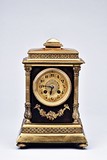 A VINTAGE FRENCH GILT MANTLE CLOCK