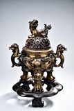 A LARGE GILT-BRONZE #MYTHICAL BEAST# TRIPOD CENSER 