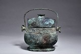 A BRONZE RITUAL WINE VESSEL AND COVER, YOU
