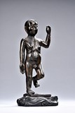 A PARCEL-GILT BRONZE FIGURE OF INFANT BUDDHA 