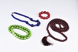 A SET OF THREE BEADED NECKLACES 