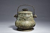 A BRONZE RITUAL WINE VESSEL AND COVER, YOU