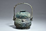 A BRONZE RITUAL WINE VESSEL AND COVER, YOU