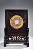 AN ARCHAIC JADE DISC INLAID HARDWOOD SCREEN