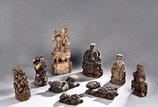 A SET OF NINE WOODEN FIGURES 