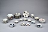 A SET OF PORCELAIN BOWLS AND CUPS 