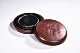 A CIRCULAR INKSTONE WITH CASE