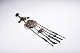 A SILVER CHAINED PENDANT ORNAMENT 