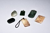 A SET OF SIX JADE PLAQUES