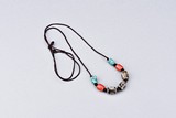 A DZI BEAD AND TURQUOISE NECKLACE