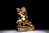 A GILT BRONZE FIGURE OF VAJRAPANI