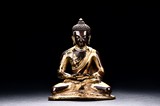 A PARCEL-GILT STATUE OF AMITABHA