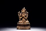 A GILT BRONZE MANJUSHRI STATUE