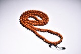 AN AMBER NECKLACE OF 109 BEADS