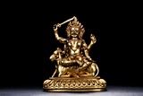 A TIBETAN GILT BRONZE FIGURE OF PALDEN LHAMO