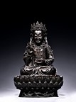 A LARGE BRONZE CAST GUANYIN ON LOTUS THRONE