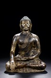 A PARCEL-GILT FIGURE OF SHAKYAMUNI