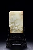A WHITE JADE 'PAVILLION AND FIGURES' TABLE SCREEN