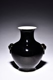 A MIRROR BLACK GLAZED VASE