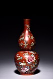 A FAMILLE ROSE CORAL-RED GROUND DOUBLE GOURD VASE
