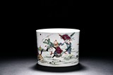 A FAMILLE ROSE PORCELAIN FIGURAL BRUSH POT