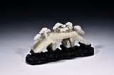 A WHITE JADE CARVED BRIDGE