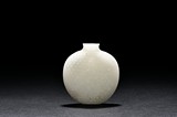 A WHITE JADE 'BROCADE SASH' SNUFF BOTTLE