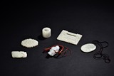 A GROUP OF SIX WHITE JADE ORNAMENTS