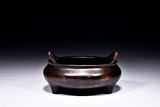 A XUANDE BRONZE CAST TRIPOD CENSER