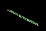 A JADEITE 18K GOLD DIAMOND BRACELET