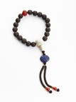 AN ALOESWOOD ROSARY BRACELET
