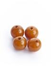 A SET OF FOUR AMBER BEADS