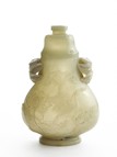A WHITE JADE 'CRANE AND LOTUS' VASE