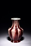 AN OCTAGONAL RED GLAZED VASE 