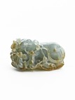 A JADEITE 'MOUSE' CARVING