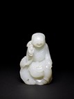 A WHITE JADE CARVED LIUHAI AND TOAD