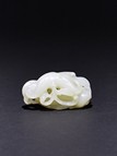A WHITE JADE CARVING