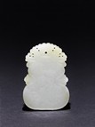 A WHITE JADE DOUBLE GOURD PENDANT