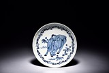 A BLUE AND WHITE 'BUFFALO' DISH