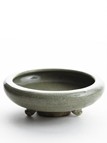 A LONGQUAN CELADON 'WAN' TRIPOD WASHER