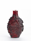 A RED GLASS 'ZHONG KUI' SNUFF BOTTLE
