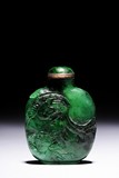 A NATURAL JADEITE MOTTLED GREEN SNUFF BOTTLE